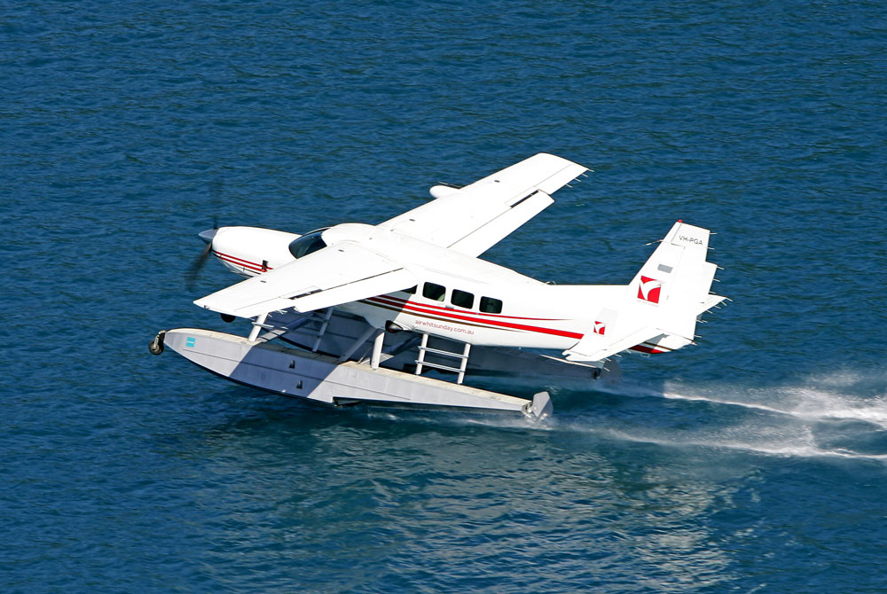 Experience the whitsundays from above with an amazing one hour flight · fly over the the naturally formed scenic heart reef · cruise over whitehaven beach, hill . Whitehaven Experience Seaplane Flight Scenic Flight Booker